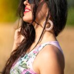 side-view-smiling-woman-standing-outdoors_252952-275
